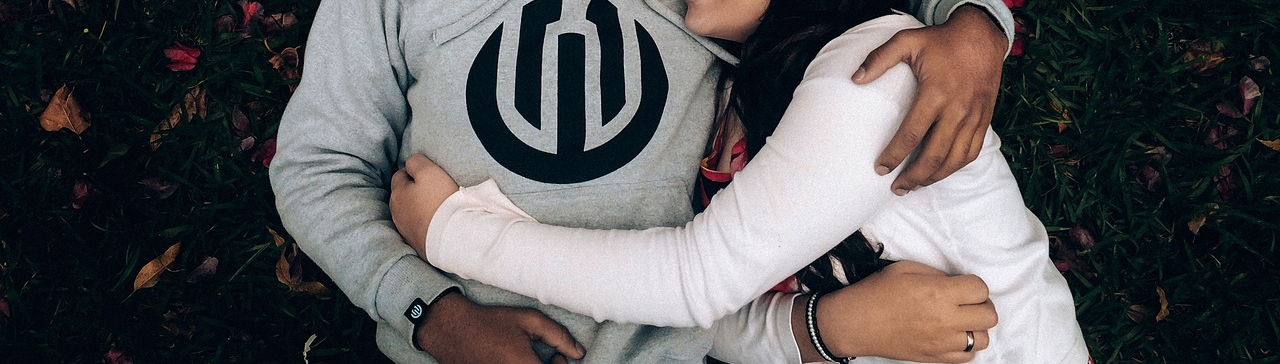 Couple cuddling with each other